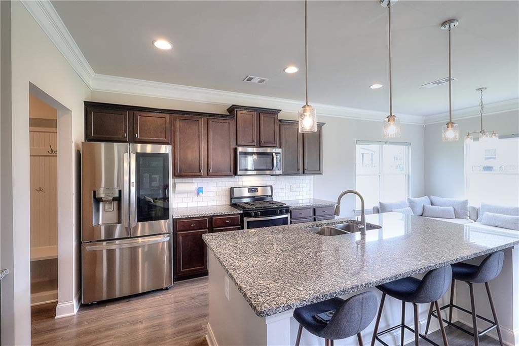 4 bedroom, 4 bathroom, 2,688 sq ft single family residence for sale at 1319 Kim Manor Way, Lawrenceville, GA 30043 — photo 2