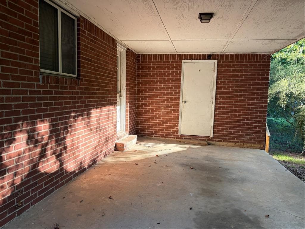 3 bedroom, 2 bathroom, 1,418 sq ft single family residence under contract at 1118 E Fayetteville Road, Riverdale, GA 30296 — photo 4