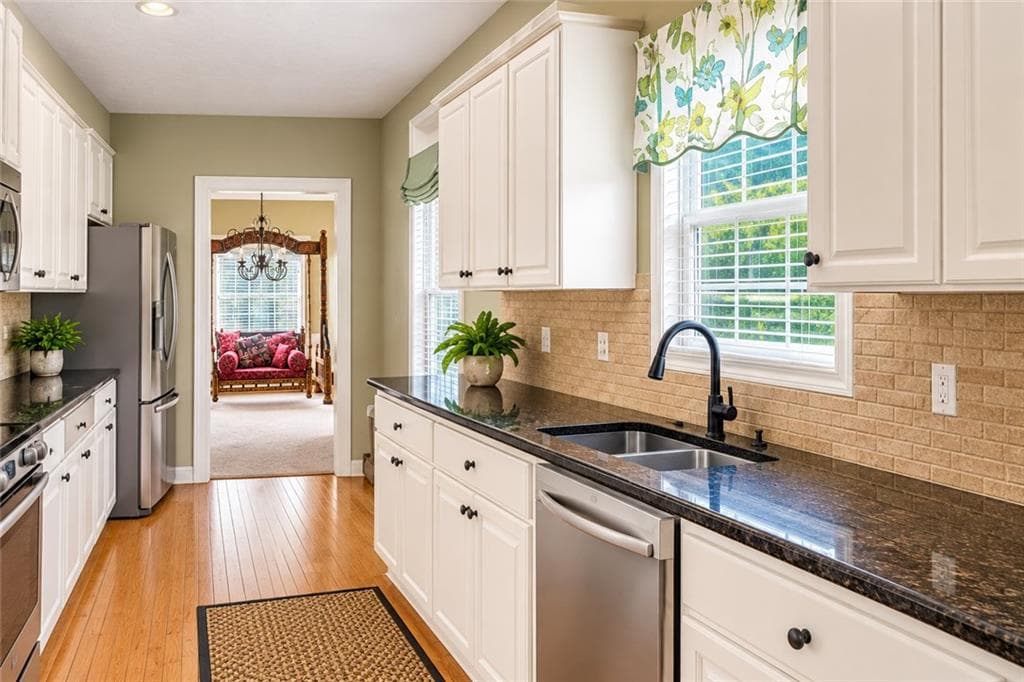 3 bedroom, 2 bathroom, 1,715 sq ft single family residence for sale at 905 Downyshire Drive, Lawrenceville, GA 30044 — photo 4