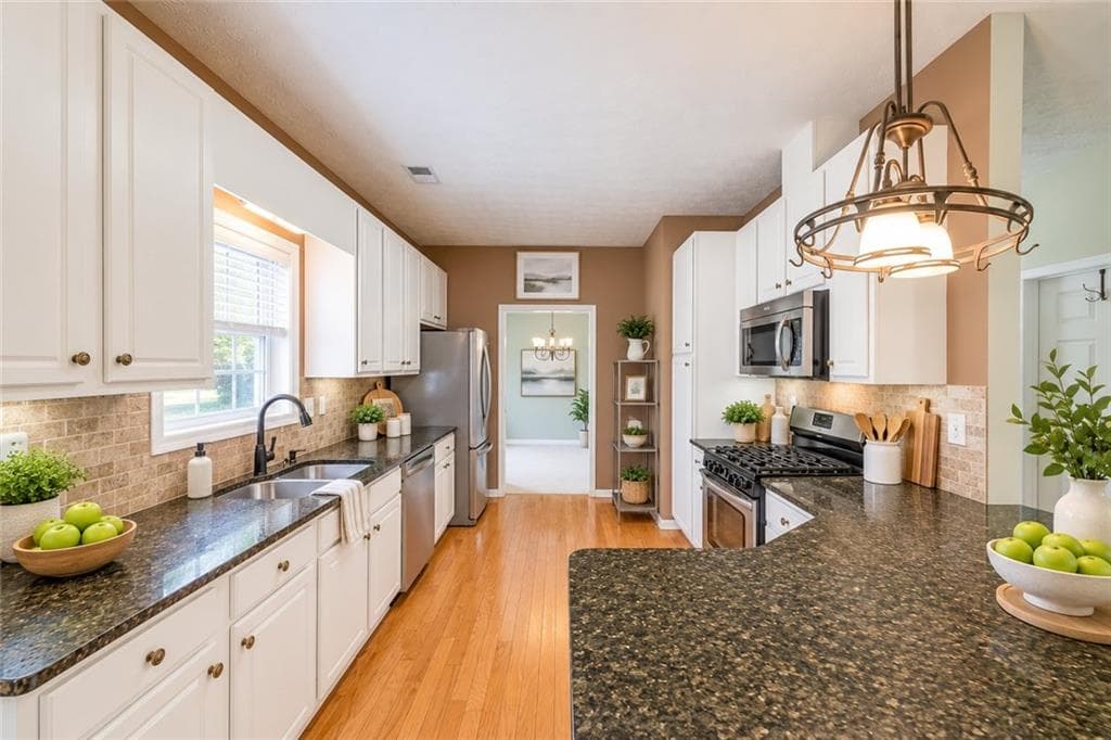 3 bedroom, 2 bathroom, 1,715 sq ft single family residence for sale at 905 Downyshire Drive, Lawrenceville, GA 30044 — photo 7