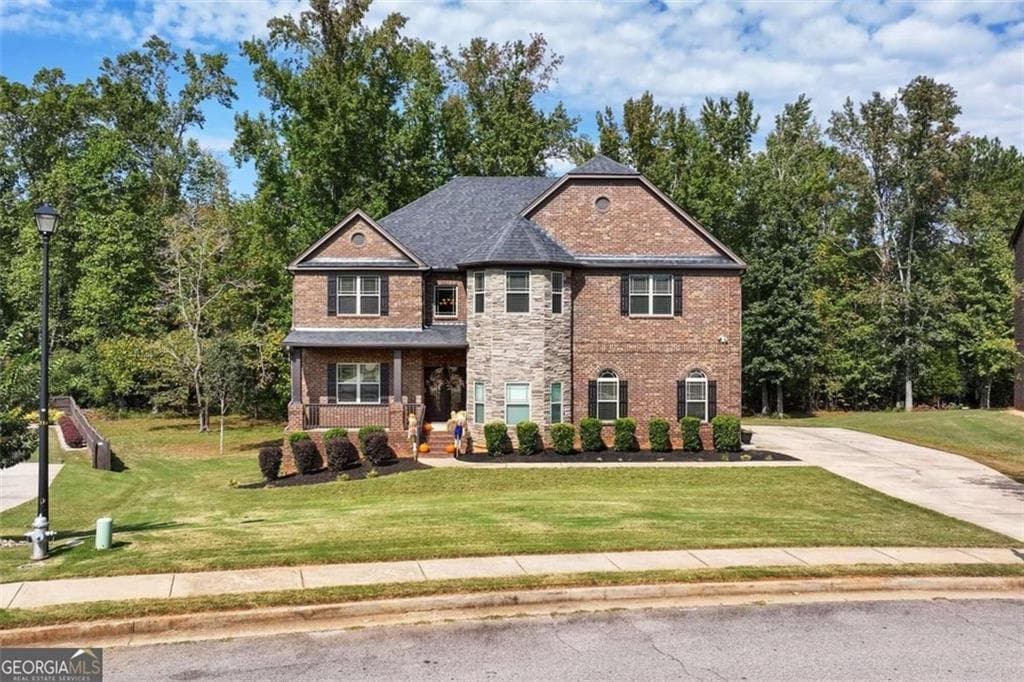 6 bedroom, 5 bathroom, 6,769 sq ft single family residence for sale at 2214 Golden Eagle Drive, Locust Grove, GA 30248