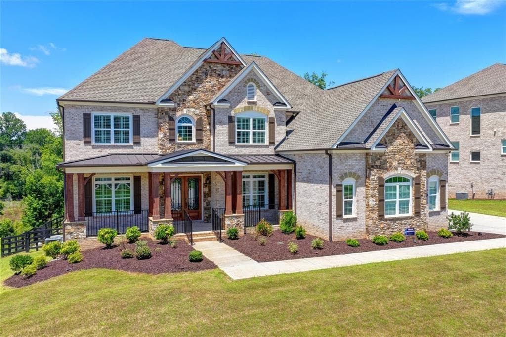 6 bedroom, 7 bathroom, 7,466 sq ft single family residence for sale at 7720 Wild Violet Drive, Cumming, GA 30040 — photo 3