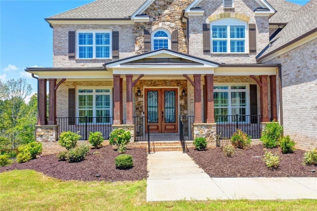 6 bedroom, 7 bathroom, 7,466 sq ft single family residence for sale at 7720 Wild Violet Drive, Cumming, GA 30040 — photo 4