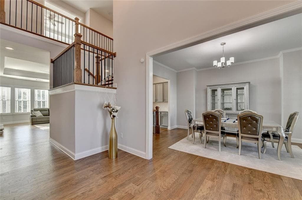 6 bedroom, 7 bathroom, 7,466 sq ft single family residence for sale at 7720 Wild Violet Drive, Cumming, GA 30040 — photo 6