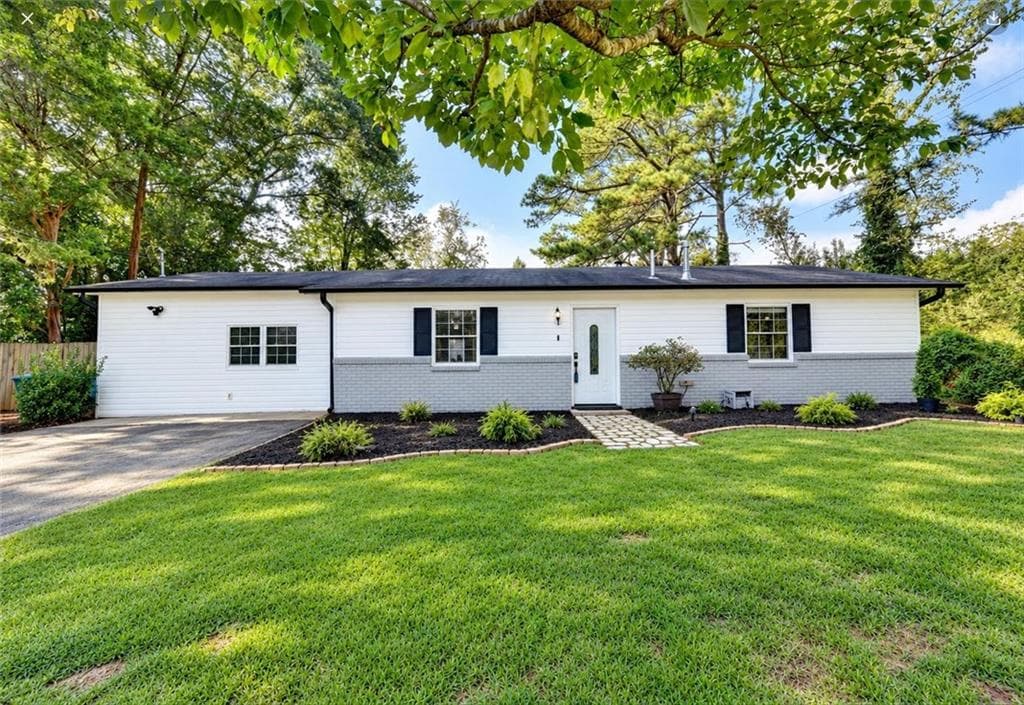 3 bedroom, 2 bathroom, 1,320 sq ft single family residence for sale at 4391 Bryant Drive, Lilburn, GA 30047 — photo 1 of 45