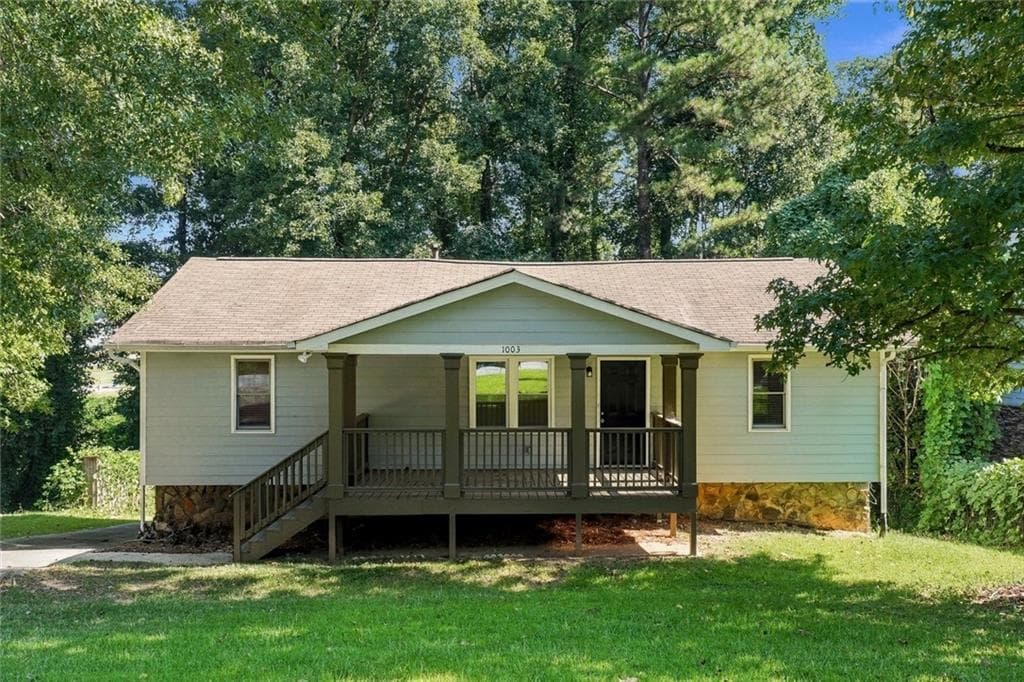 3 bedroom, 2 bathroom, 1,222 sq ft single family residence for sale at 1003 Salisbury Trail, Riverdale, GA 30296 — photo 2