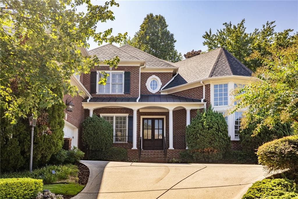 5 bedroom, 7 bathroom, 4,150 sq ft single family residence for sale at 825 Glengate Place, Atlanta, GA 30328