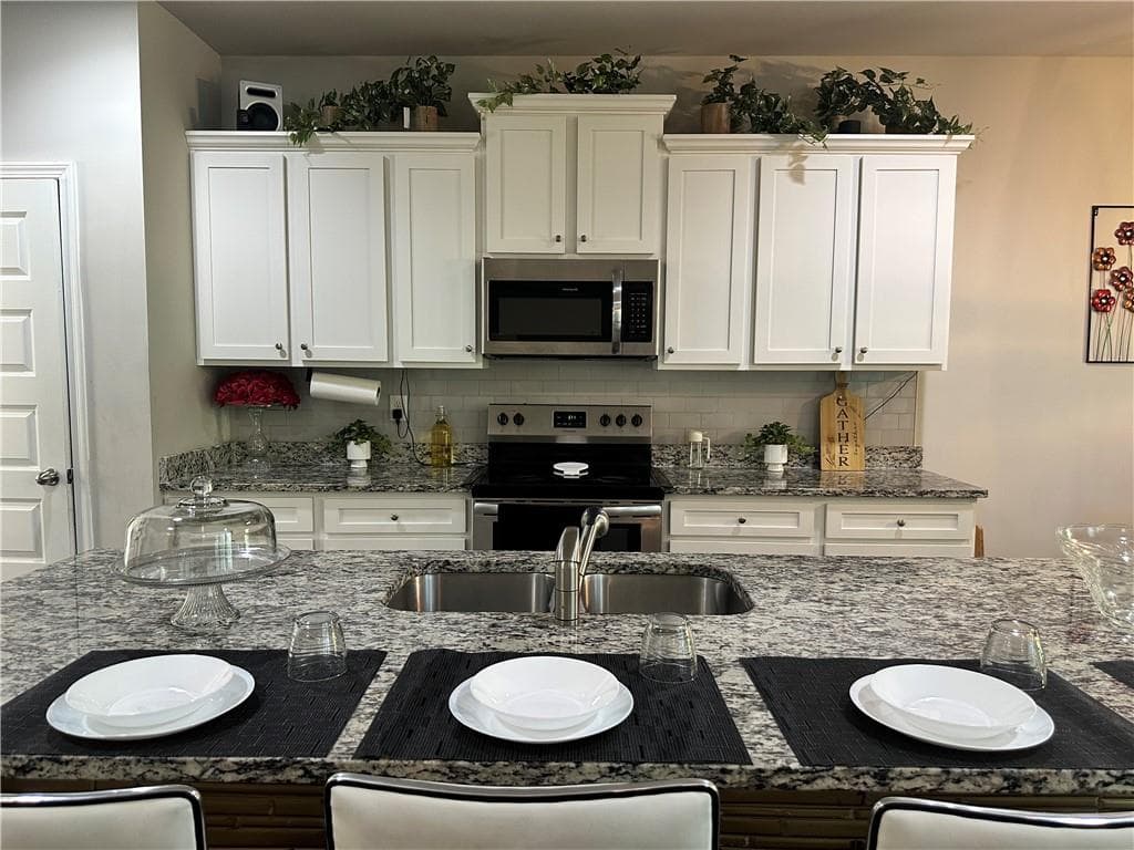 5 bedroom, 4 bathroom, 2,582 sq ft single family residence for sale at 20 Richmond Trail, Oxford, GA 30054 — photo 6