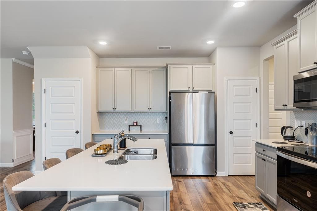 4 bedroom, 4 bathroom, 2,756 sq ft single family residence for sale at 1052 Bodega Loop, Locust Grove, GA 30248 — photo 8