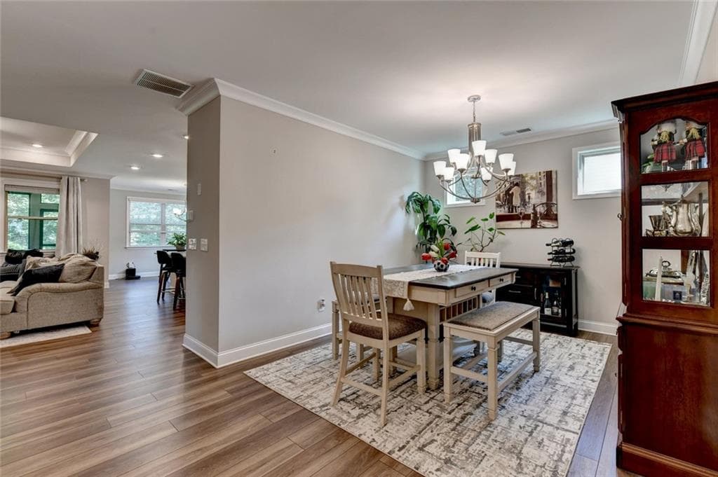 5 bedroom, 4 bathroom, 3,818 sq ft single family residence for sale at 2980 Coach River Way, Cumming, GA 30040 — photo 5