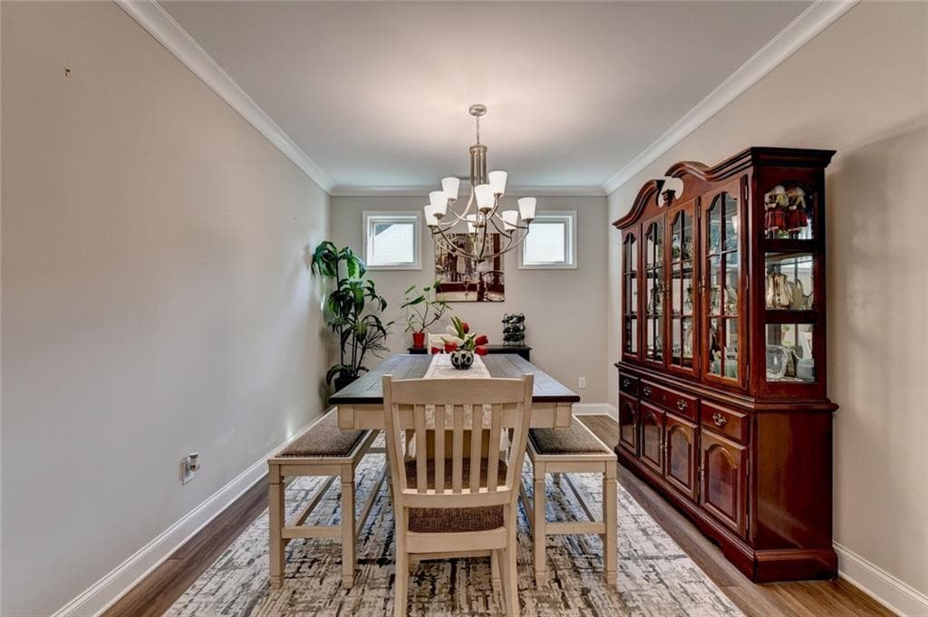 5 bedroom, 4 bathroom, 3,818 sq ft single family residence for sale at 2980 Coach River Way, Cumming, GA 30040 — photo 7
