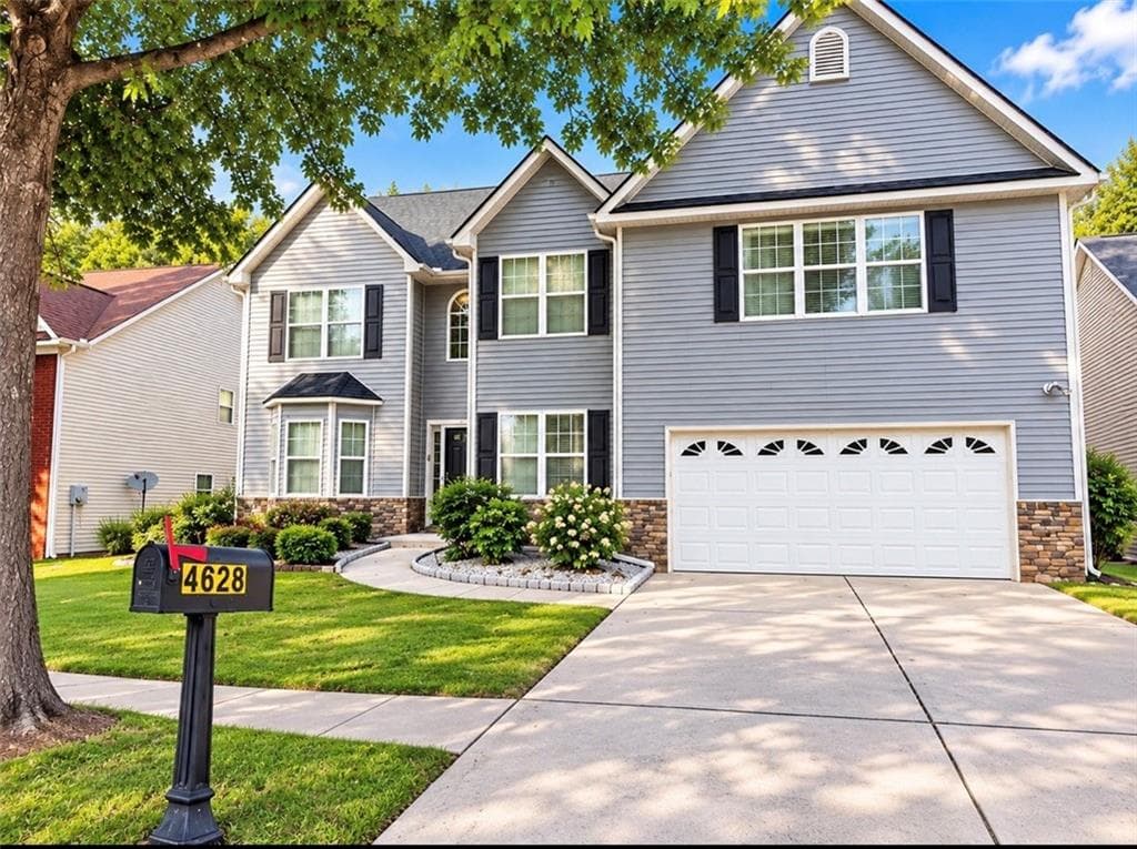 5 bedroom, 4 bathroom, 3,417 sq ft single family residence for sale at 4628 Chafin Point Court, Snellville, GA 30039 — photo 1 of 21
