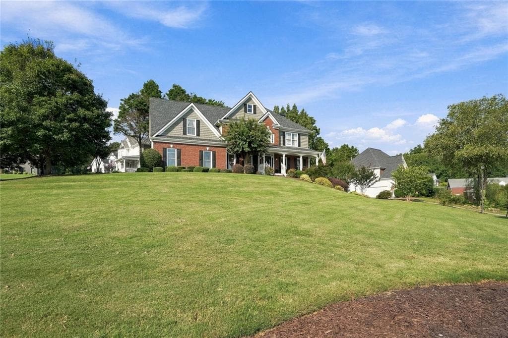 5 bedroom, 4 bathroom, 3,861 sq ft single family residence for sale at 4910 Montclair Trail, Cumming, GA 30040 — photo 4