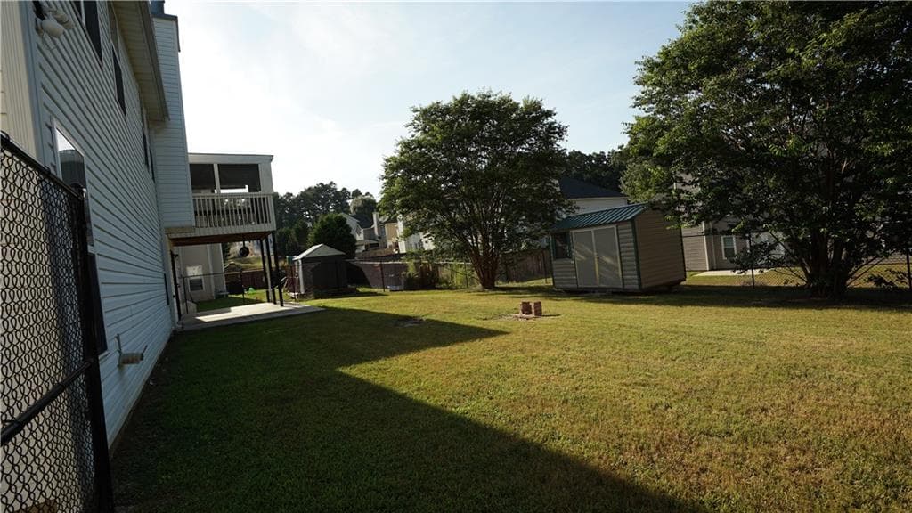 5 bedroom, 3 bathroom, 2,905 sq ft single family residence for sale at 2010 Hillspring Lane, Lithonia, GA 30058 — photo 4