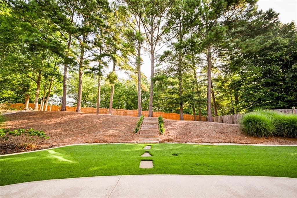 5 bedroom, 3 bathroom, 2,208 sq ft single family residence for sale at 3438 RIDGEMILL Circle, Dacula, GA 30019 — photo 8