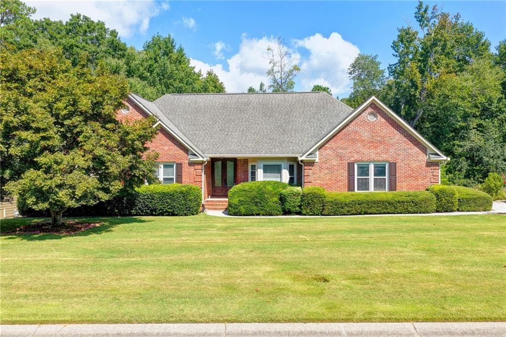 6 bedroom, 4 bathroom, 4,044 sq ft home for sale at 1975 Wynfield Point Drive, Buford, GA