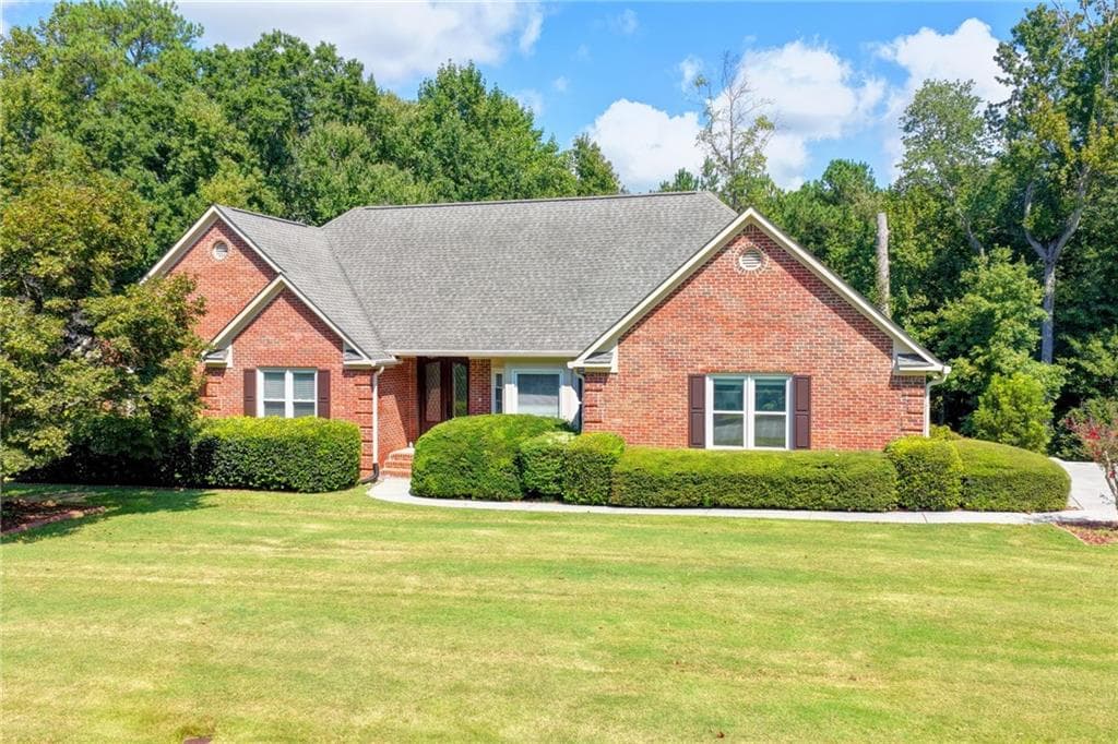 6 bedroom, 4 bathroom, 4,044 sq ft single family residence for sale at 1975 Wynfield Point Drive, Buford, GA 30519 — photo 2