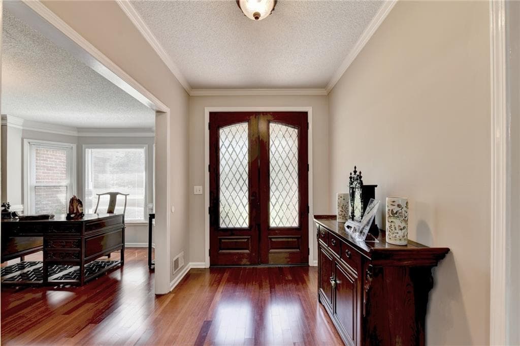 6 bedroom, 4 bathroom, 4,044 sq ft single family residence for sale at 1975 Wynfield Point Drive, Buford, GA 30519 — photo 4
