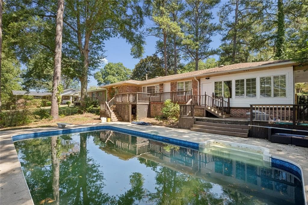 4 bedroom, 2 bathroom, 1,846 sq ft single family residence for sale at 2677 Lancaster Drive, East Point, GA 30344 — photo 2