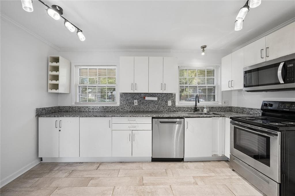 4 bedroom, 2 bathroom, 1,846 sq ft single family residence for sale at 2677 Lancaster Drive, East Point, GA 30344 — photo 8