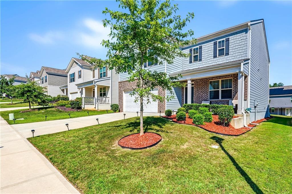 4 bedroom, 3 bathroom, 2,190 sq ft single family residence for sale at 5384 Pennington Court, Atlanta, GA 30349 — photo 2