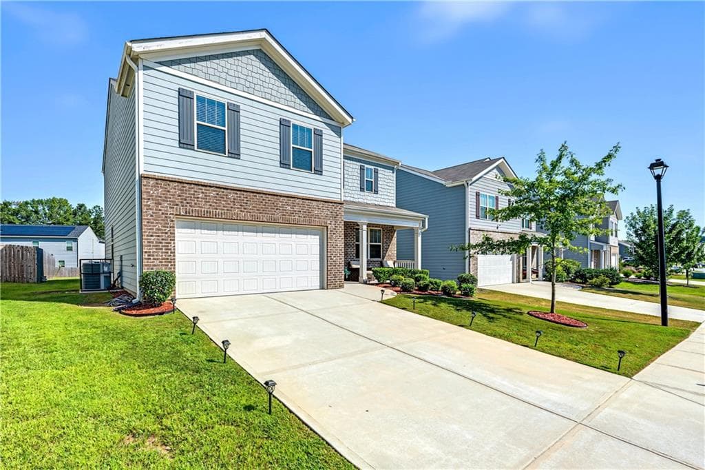 4 bedroom, 3 bathroom, 2,190 sq ft single family residence for sale at 5384 Pennington Court, Atlanta, GA 30349 — photo 3