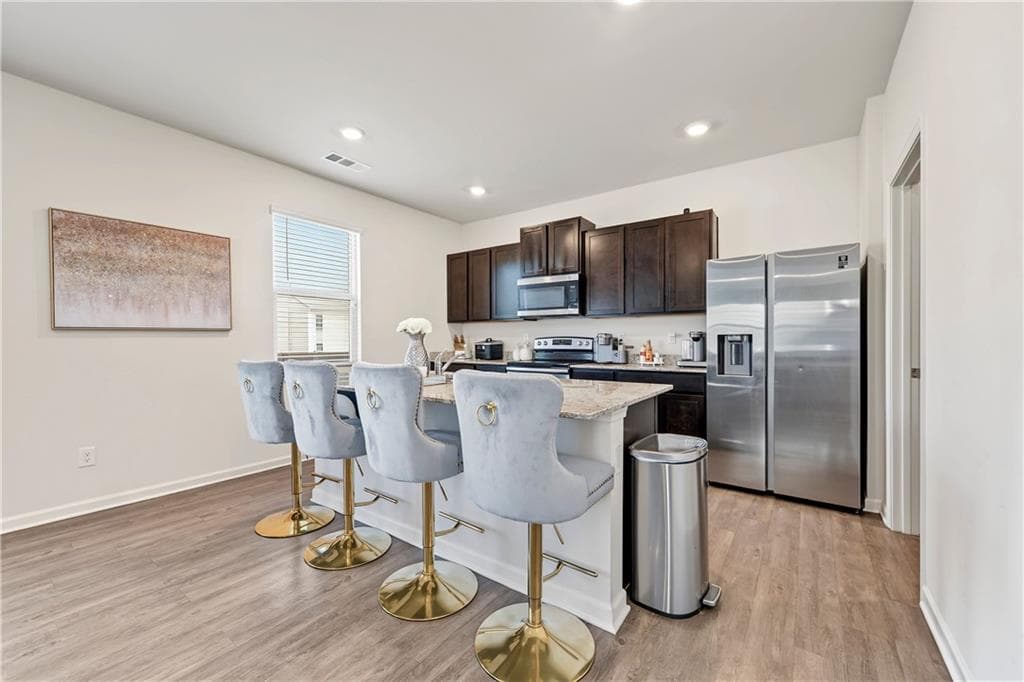 4 bedroom, 3 bathroom, 2,190 sq ft single family residence for sale at 5384 Pennington Court, Atlanta, GA 30349 — photo 9