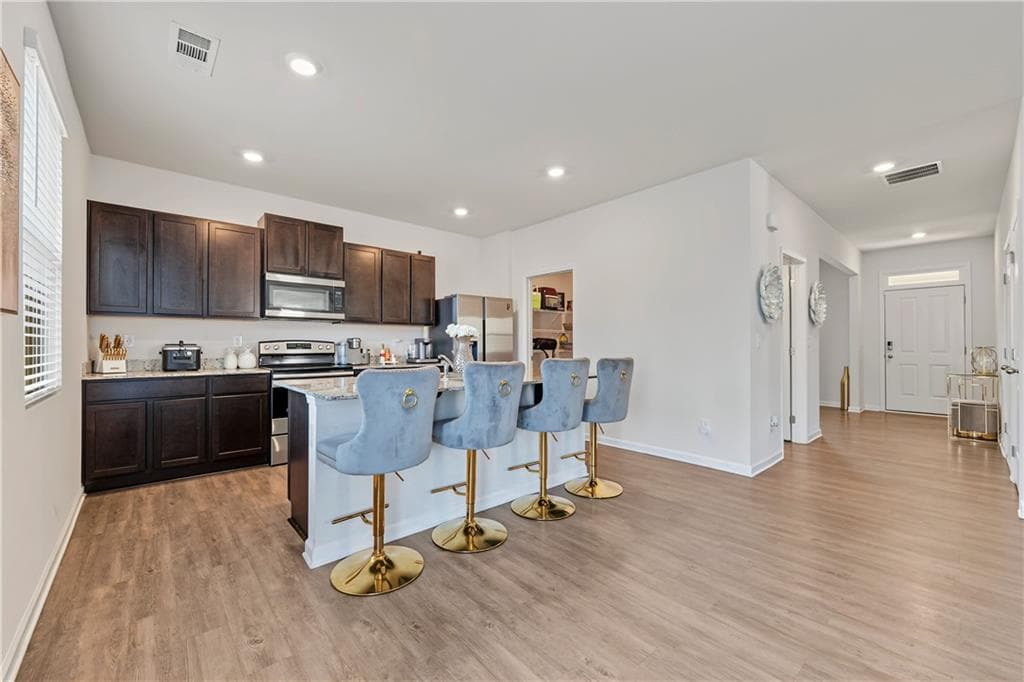 4 bedroom, 3 bathroom, 2,190 sq ft single family residence for sale at 5384 Pennington Court, Atlanta, GA 30349 — photo 10
