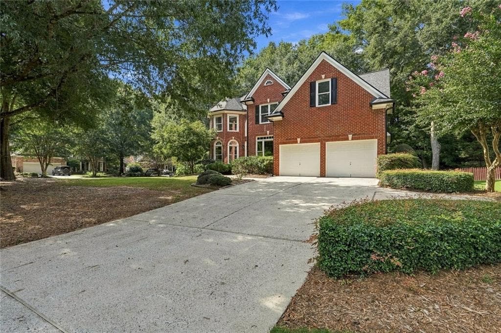 5 bedroom, 4 bathroom, 3,954 sq ft single family residence for sale at 238 Rivergate Drive, Suwanee, GA 30024 — photo 3