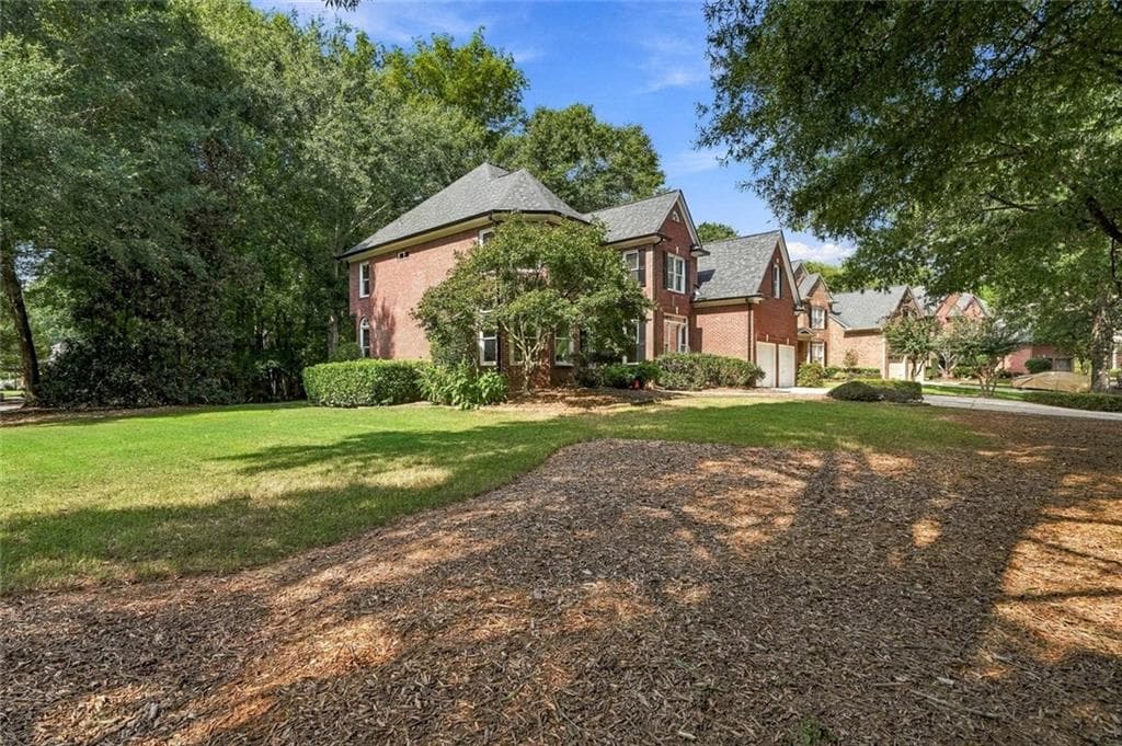 5 bedroom, 4 bathroom, 3,954 sq ft single family residence for sale at 238 Rivergate Drive, Suwanee, GA 30024 — photo 4