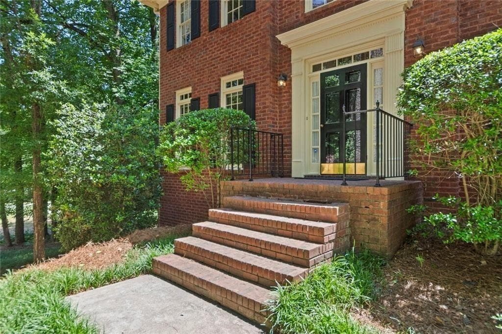 5 bedroom, 4 bathroom, 4,046 sq ft single family residence for sale at 2010 Milfield Circle, Snellville, GA 30078 — photo 3