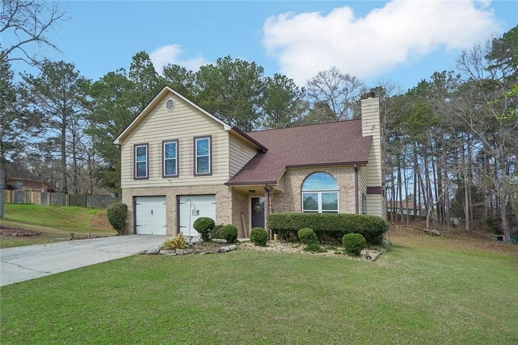 4 bedroom, 3 bathroom, 2,398 sq ft home for sale at 2100 Green Tree Court, Lithonia, GA