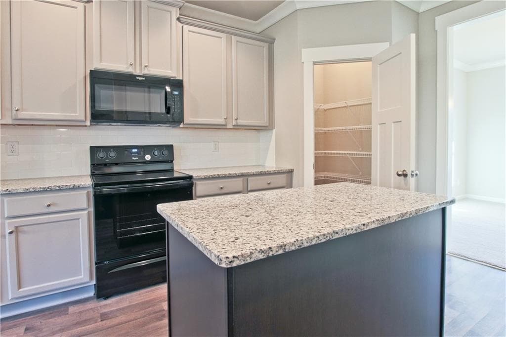 5 bedroom, 3 bathroom, 2,736 sq ft single family residence for rent at 1242 Ida Woods Lane, Lawrenceville, GA 30045 for $3,300 a month — photo 4