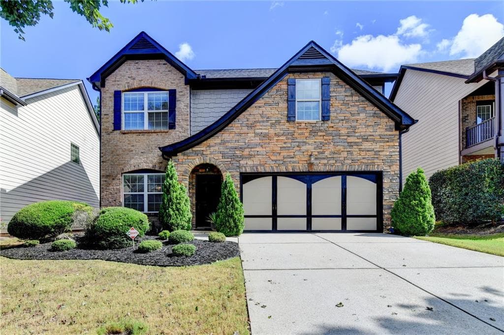 4 bedroom, 3 bathroom, 2,456 sq ft single family residence for sale at 5247 Blossom Brook Drive, Sugar Hill, GA 30518 — photo 1 of 54