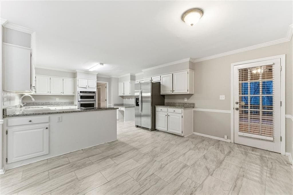 4 bedroom, 3 bathroom, 2,974 sq ft single family residence for sale at 4397 Windsor Oaks Circle, Marietta, GA 30066 — photo 9