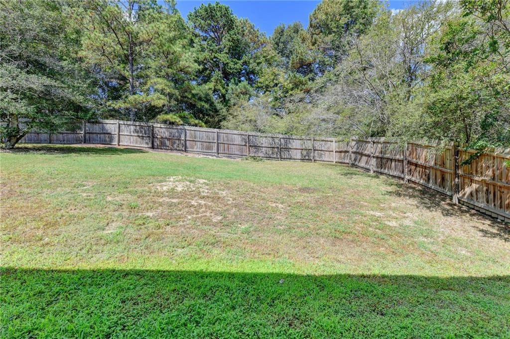 4 bedroom, 3 bathroom, 2,158 sq ft single family residence for sale at 3422 Cascade Ive Drive, Buford, GA 30519 — photo 7