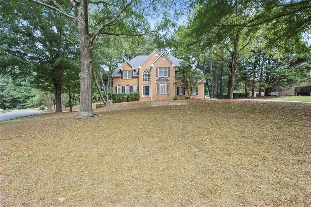 5 bedroom, 4 bathroom, 3,835 sq ft single family residence for sale at 3235 Lake Russell Way, Buford, GA 30519 — photo 2
