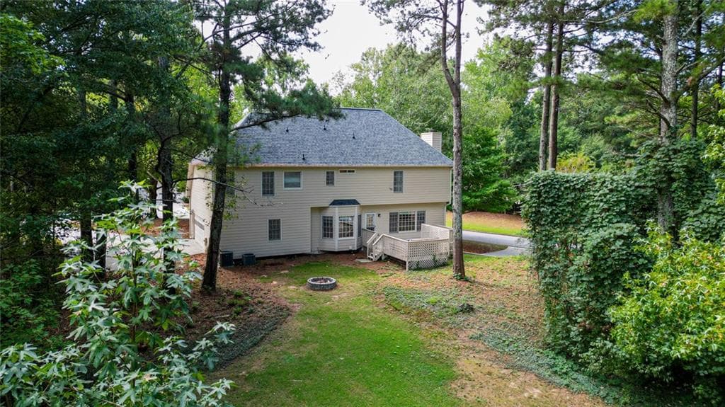 5 bedroom, 4 bathroom, 3,835 sq ft single family residence for sale at 3235 Lake Russell Way, Buford, GA 30519 — photo 6