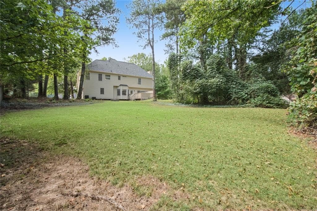 5 bedroom, 4 bathroom, 3,835 sq ft single family residence for sale at 3235 Lake Russell Way, Buford, GA 30519 — photo 7