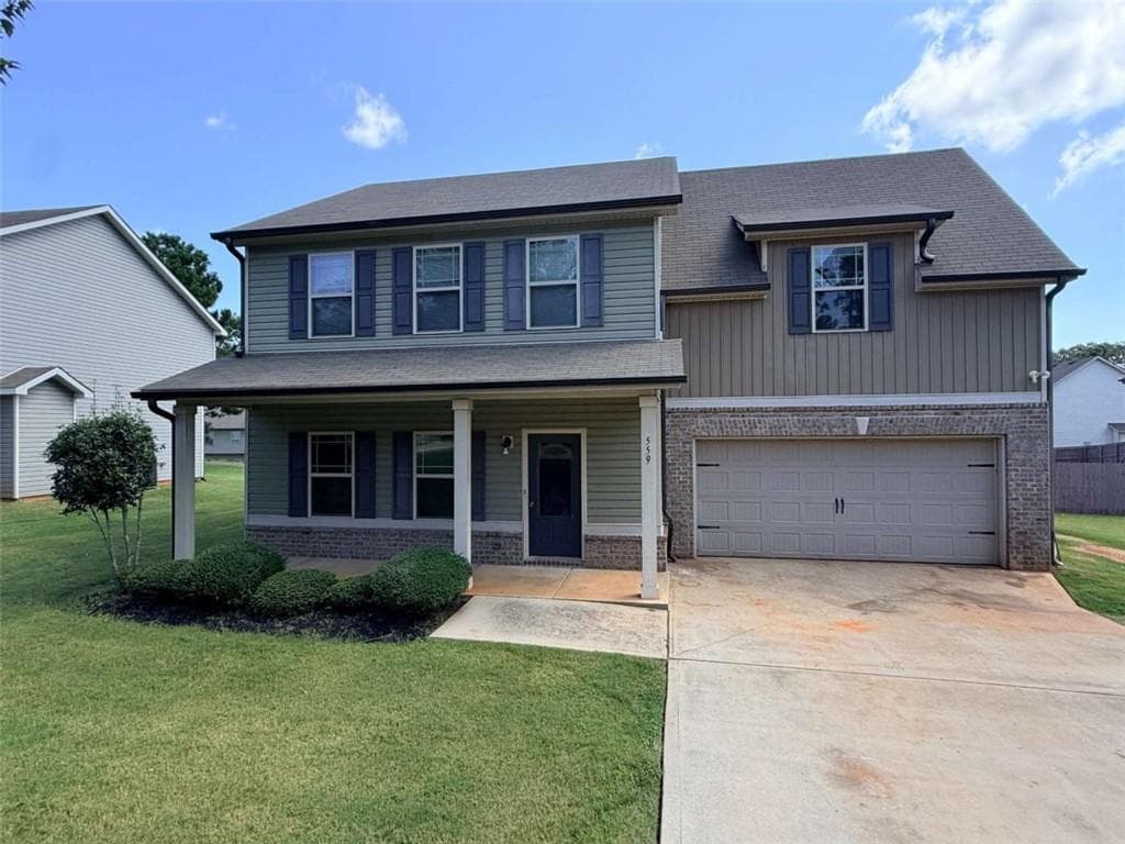 4 bedroom, 3 bathroom, 1,934 sq ft single family residence for sale at 559 Joneus Drive, Mcdonough, GA 30252 — photo 2