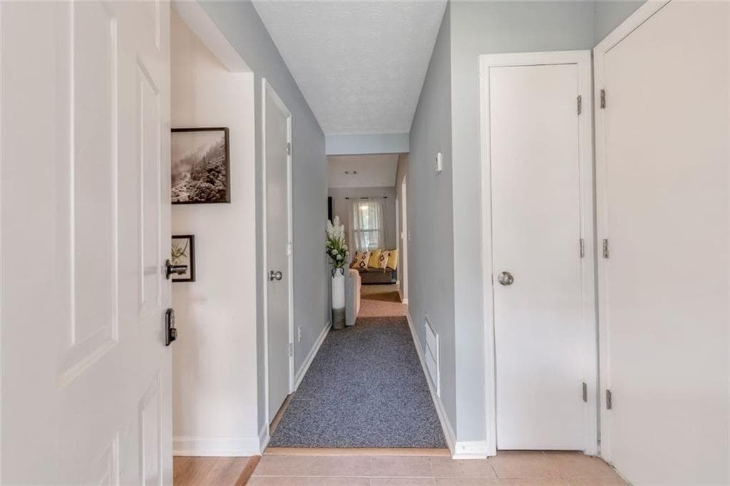 4 bedroom, 2 bathroom, 1,440 sq ft single family residence for sale at 2000 Wendover Drive, Snellville, GA 30078 — photo 2