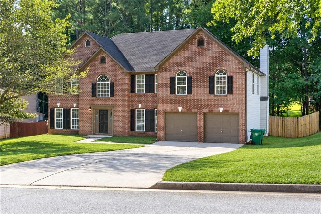 5 bedroom, 3 bathroom, 3,371 sq ft single family residence for sale at 6913 Wynmeadow Drive, Stone Mountain, GA 30087