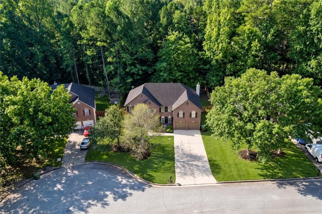 5 bedroom, 3 bathroom, 3,371 sq ft single family residence for sale at 6913 Wynmeadow Drive, Stone Mountain, GA 30087 — photo 3
