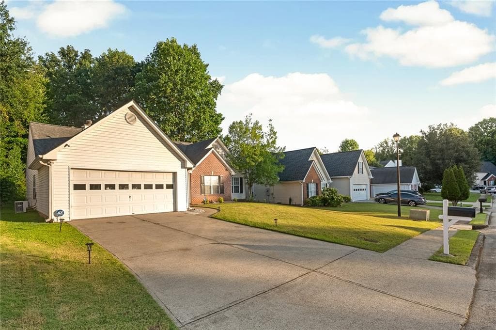3 bedroom, 2 bathroom, 1,631 sq ft single family residence for sale at 2260 Carlysle Cove Drive, Lawrenceville, GA 30044 — photo 2