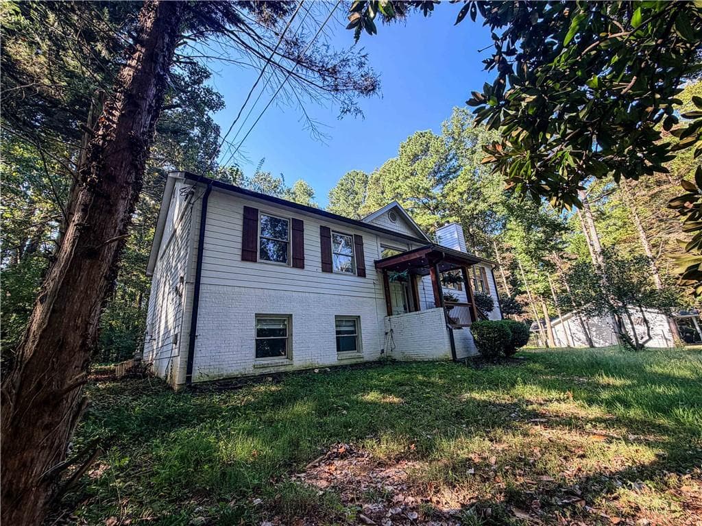 5 bedroom, 3 bathroom, 2,576 sq ft single family residence for sale at 3767 Memorial Parkway, Kennesaw, GA 30152 — photo 3
