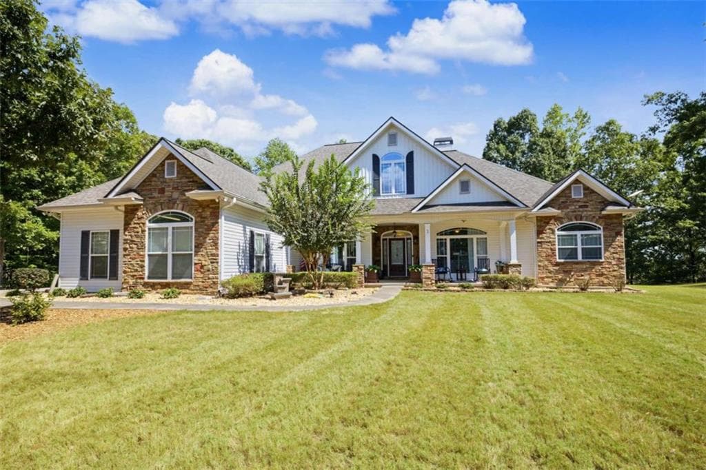 5 bedroom, 3 bathroom, 6,332 sq ft single family residence for sale at 553 Bud Davis Road, Newnan, GA 30263 — photo 2