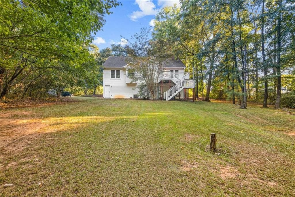 4 bedroom, 3 bathroom, 2,442 sq ft single family residence under contract at 215 Somerset Drive, Covington, GA 30016 — photo 3