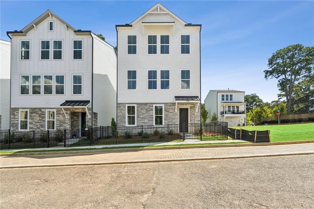 4 bedroom, 4 bathroom, 2,300 sq ft single family residence for sale at 744 Auguste Avenue, Scottdale, GA 30079