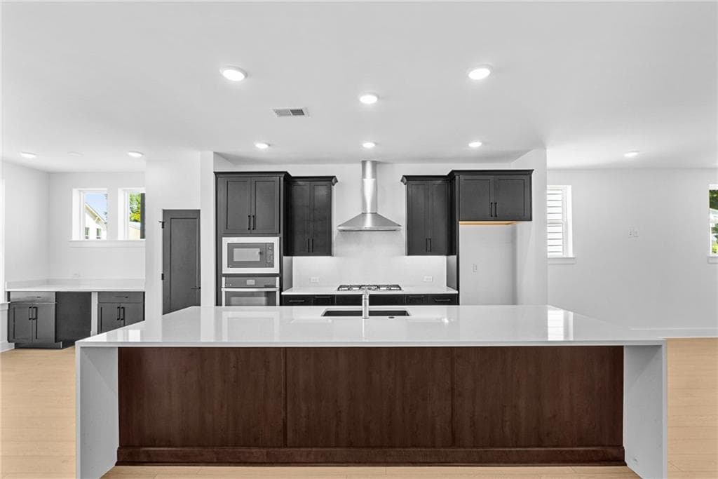 4 bedroom, 4 bathroom, 2,300 sq ft single family residence for sale at 744 Auguste Avenue, Scottdale, GA 30079 — photo 8