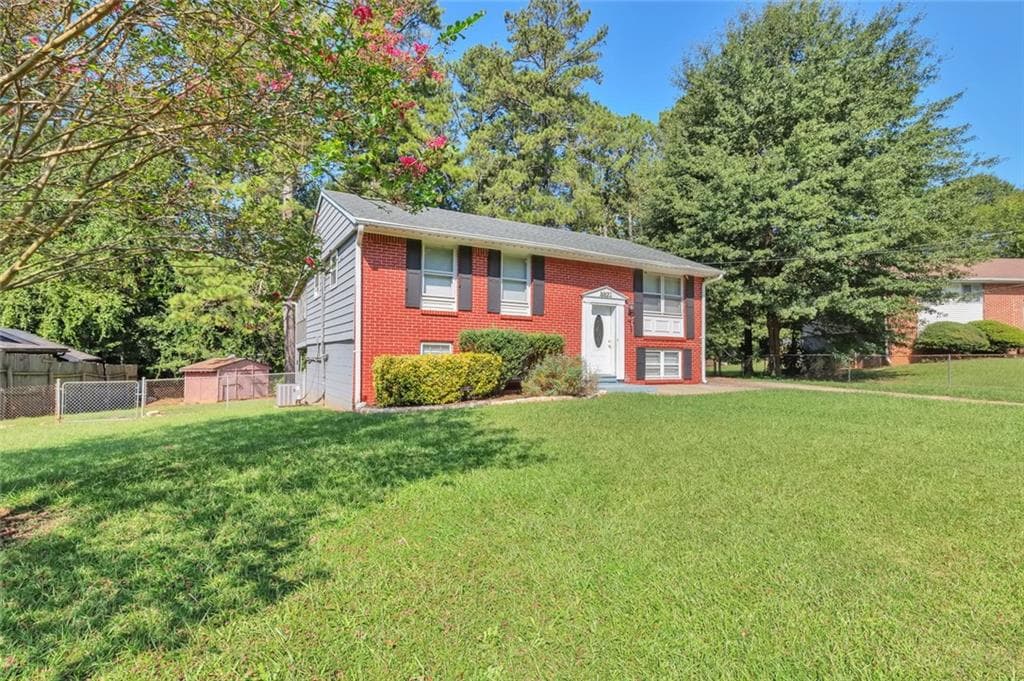 4 bedroom, 2 bathroom, 2,260 sq ft single family residence for sale at 6671 Pelican Court, Riverdale, GA 30274 — photo 2